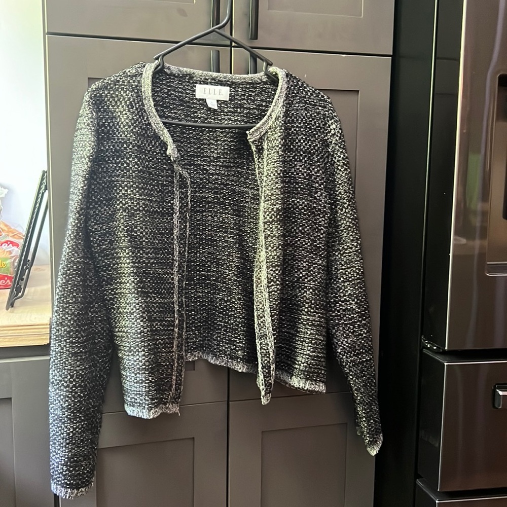Beautiful sweater that you can wear with a pair of dress pants